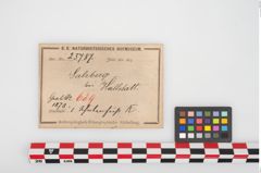 Etikett zu Bronzegefäßfuß (NHMW-PRAE-025787)